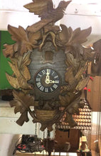 Load and play video in Gallery viewer, VINTAGE : Well Carved Traditional Eight Day Cuckoo Clock (1978)
